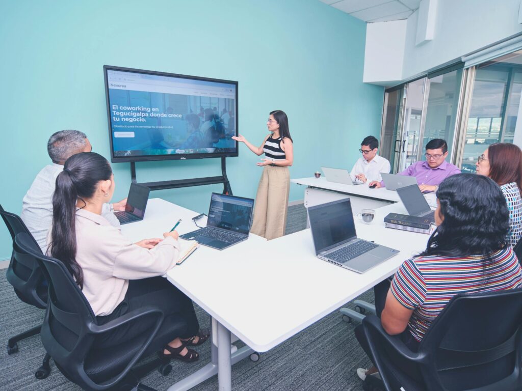 pexels photo 34233738 34233738 A diverse group in a collaborative meeting using a digital display in a modern office.
